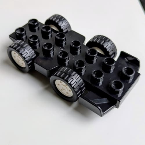 Duplo Car Base 2 x 8 with Front Spoilers, White Hubs