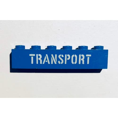 Brick 1 x 6 with 'TRANSPORT' Stencil White print