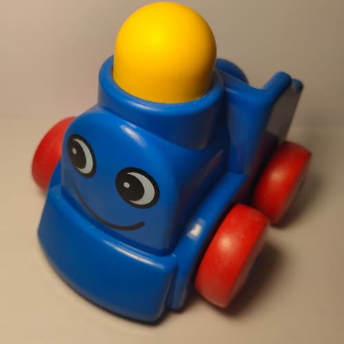 Primo Train Engine 1 x 2 with Red Wheels, Yellow Button, and Face Print