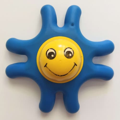 Primo Teether Star with 8 Arms, Yellow Center and Face Print