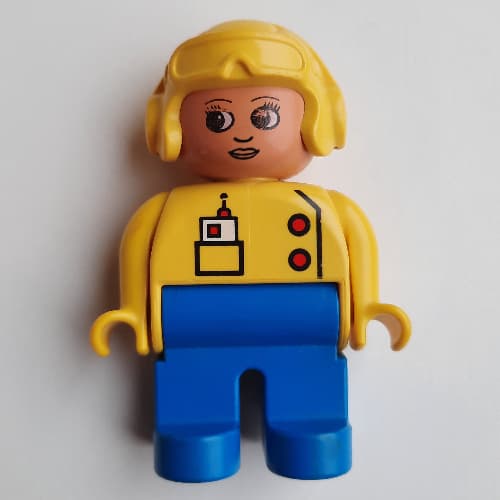 Duplo Figure, Early, Aviator Hat Yellow, Blue Legs, Two Red Buttons, Pocket with Radio Print