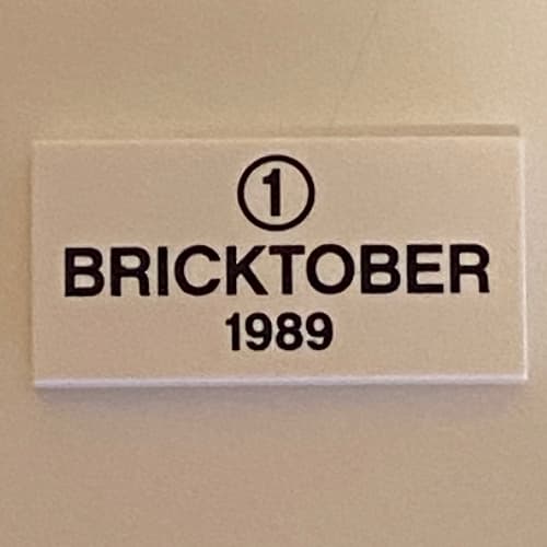 Tile 2 x 4 with '1' in Circle, 'BRICKTOBER 1989' print