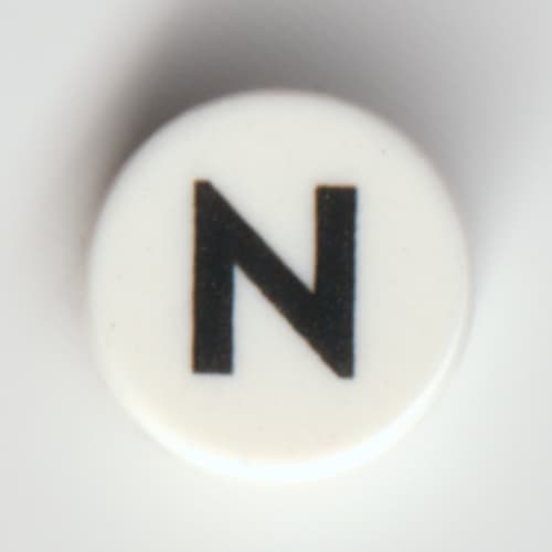 Tile Round 1 x 1 with Black 'N' print